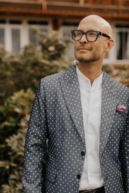 Portrait of a reception guest in a blue jacket