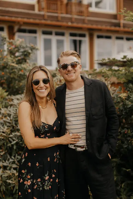 A couple together outside Alderbrook