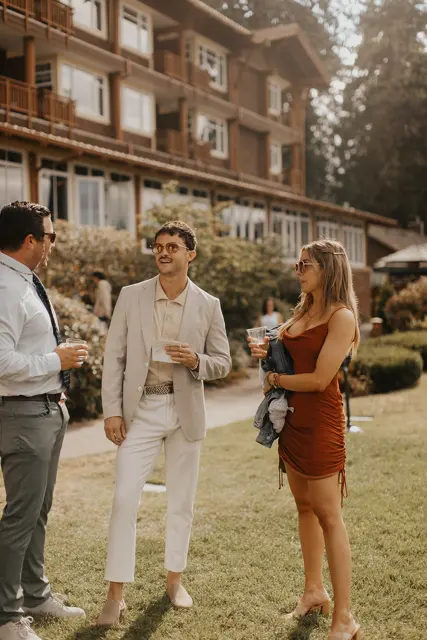 Friends chatting outside Alderbrook before dinner