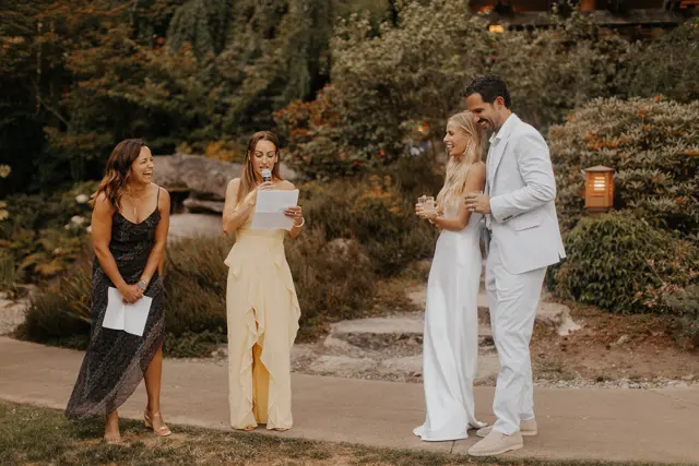 Katie and Danny with guests during the speeches