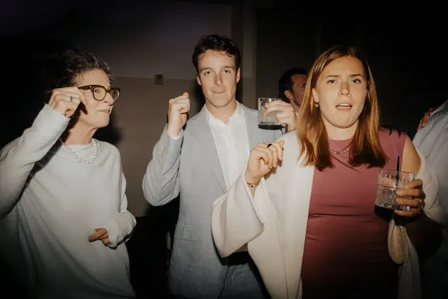 Friends celebrating together at the after party