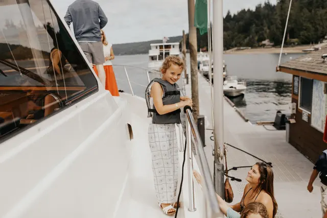 Family and guests arriving at the dock