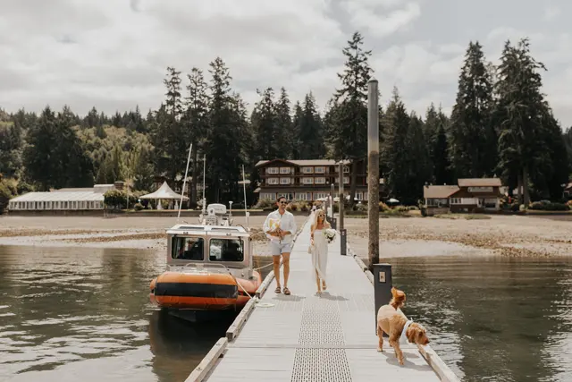 Katie and Danny walking along the Alderbrook dock