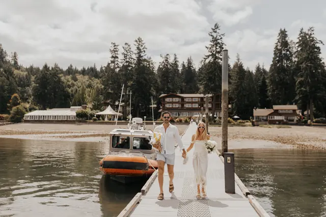 Katie and Danny walking along the Alderbrook dock
