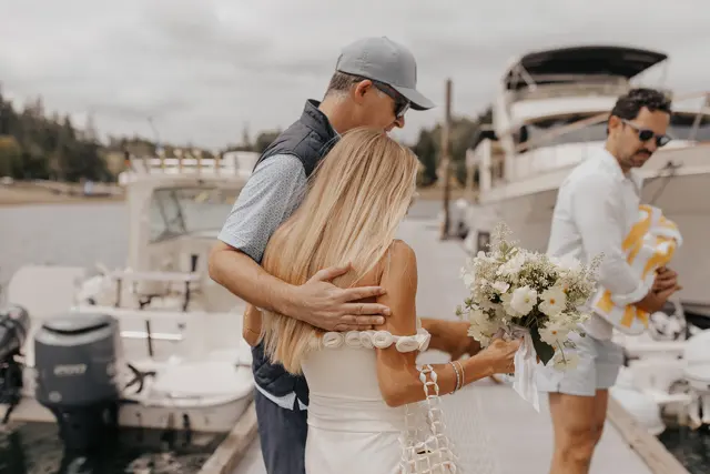 Katie greeting a guest on the dock