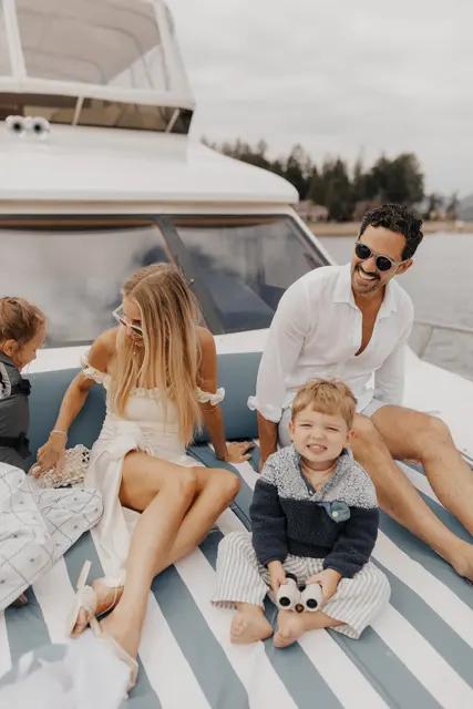 Katie and Danny with family and the dogs on the bow