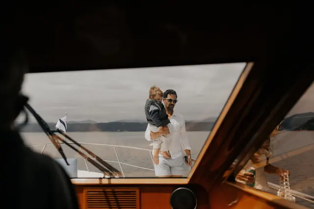 Katie and Danny framed by the boat windows