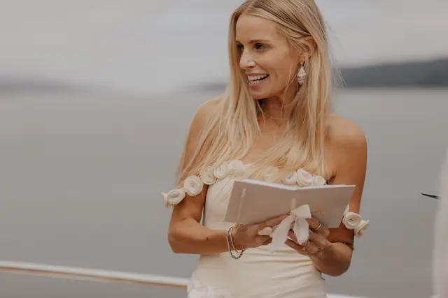 Katie reading her wedding vows to Danny