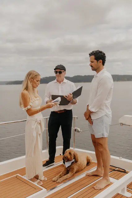 Katie reading her wedding vows to Danny