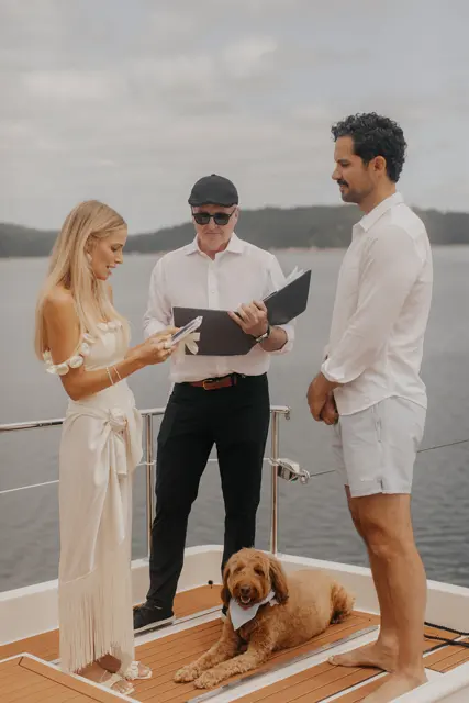Katie reading her wedding vows to Danny