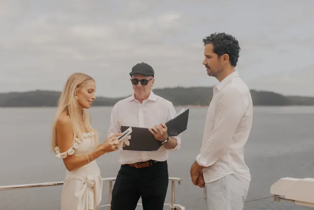 Katie reading her wedding vows to Danny