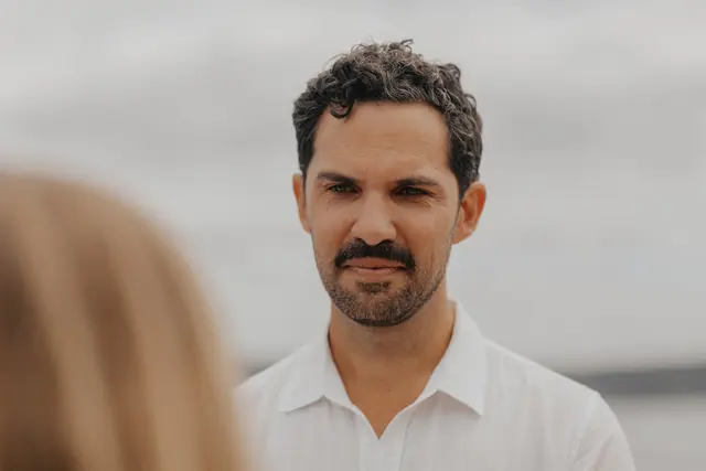 Danny listening to Katie's vows