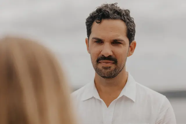 Danny listening to Katie's vows