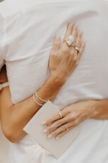 Wedding vows held close during the ceremony