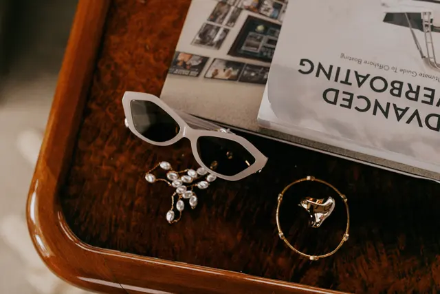 Sunglasses and jewelry aboard the boat